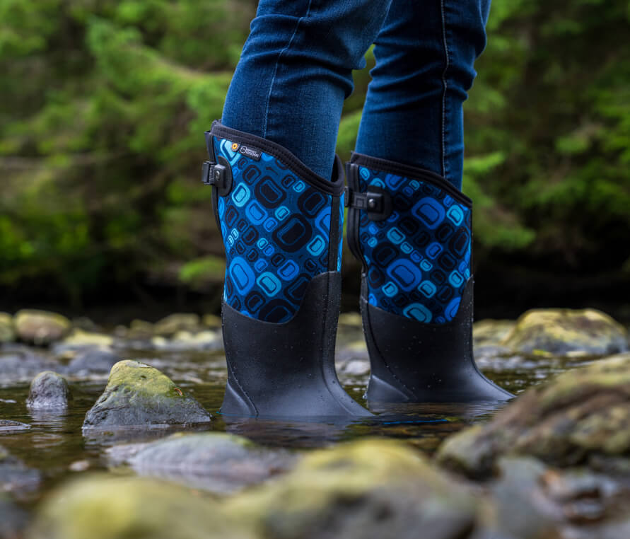 Shop our Natives Outdoors Classic Il Adjustable Calf boot in the Tlingit formline ovoid design which has various colors of blue.